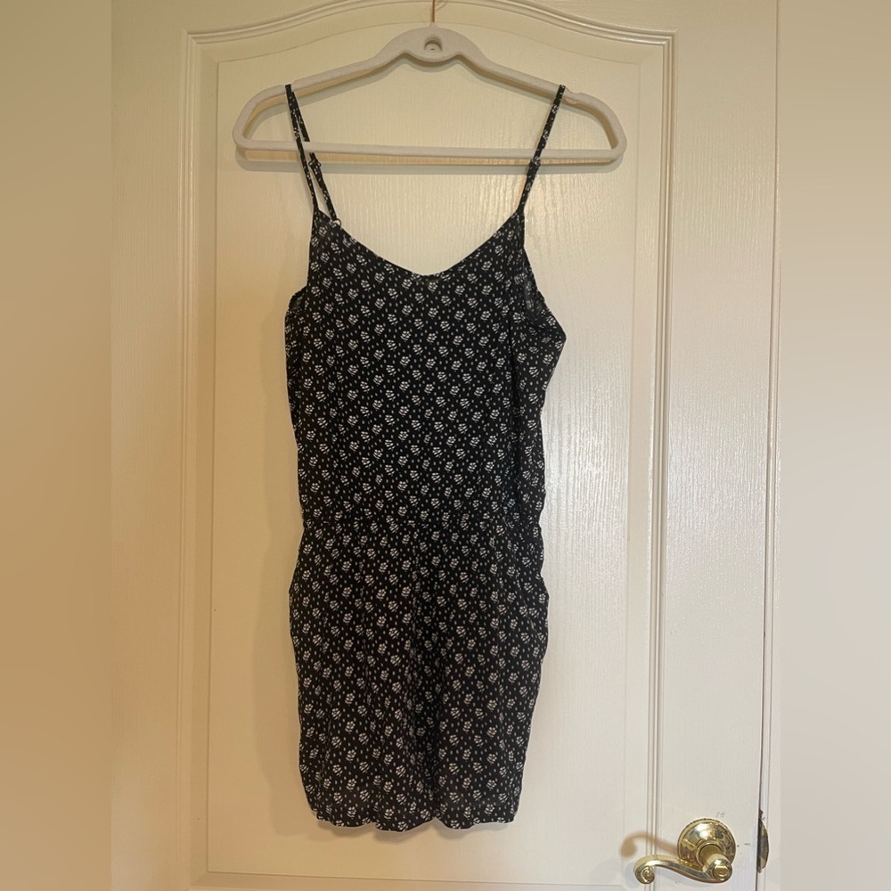Indero black floral romper​​​​​​​​